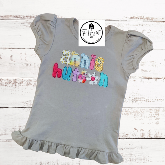 Groovy appliqué name tee