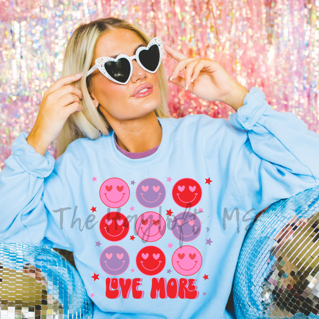 LOVE MORE SMILEY FACE SWEATSHIRT