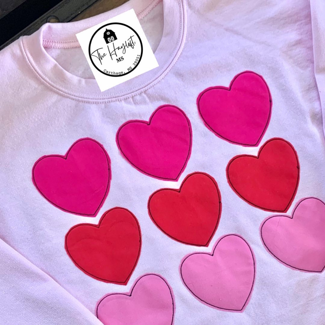 APPLIQUÉD HEARTS PINK SWEATSHIRT