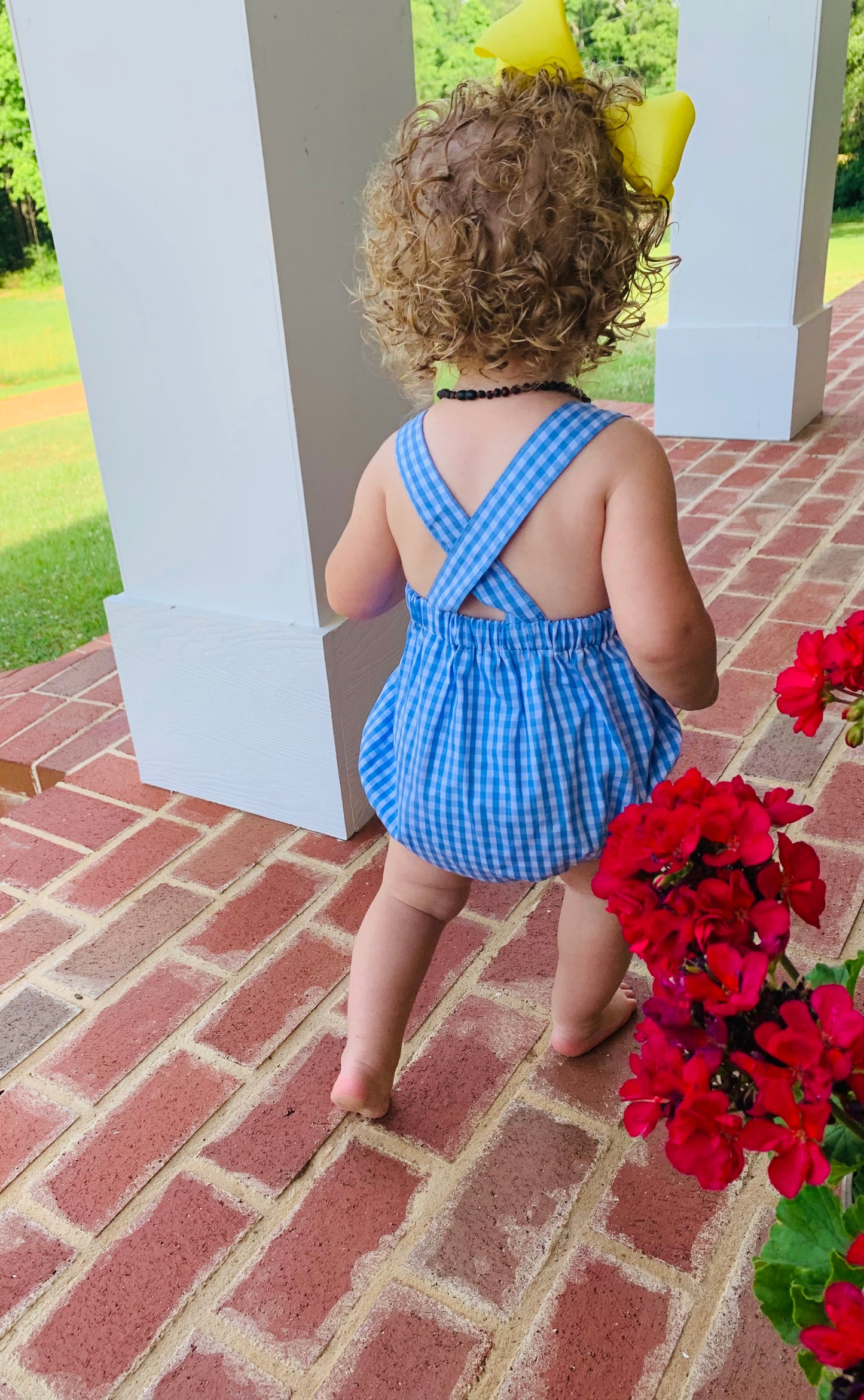 GENDER NEUTRAL FAIR SUNSUIT