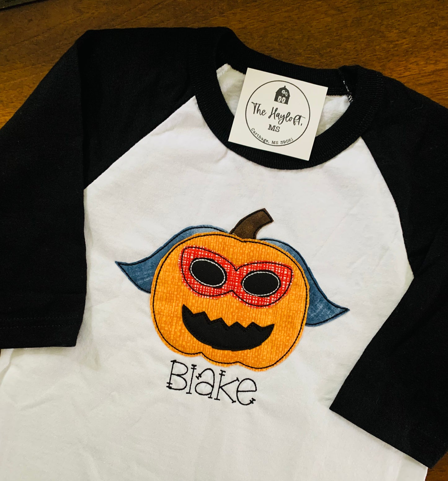 YOUTH SUPER HERO PUMPKIN BASEBALL TEE