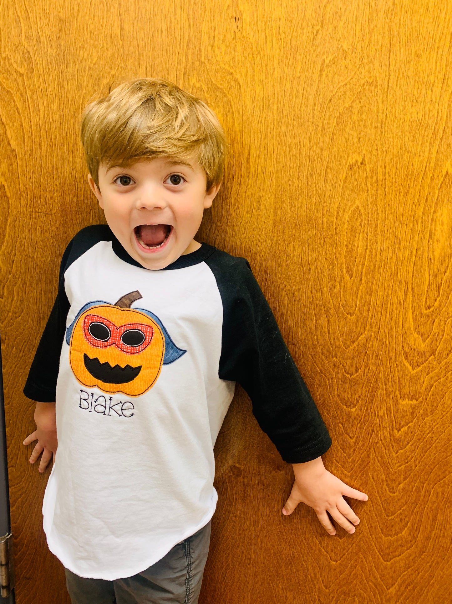 YOUTH SUPER HERO PUMPKIN BASEBALL TEE